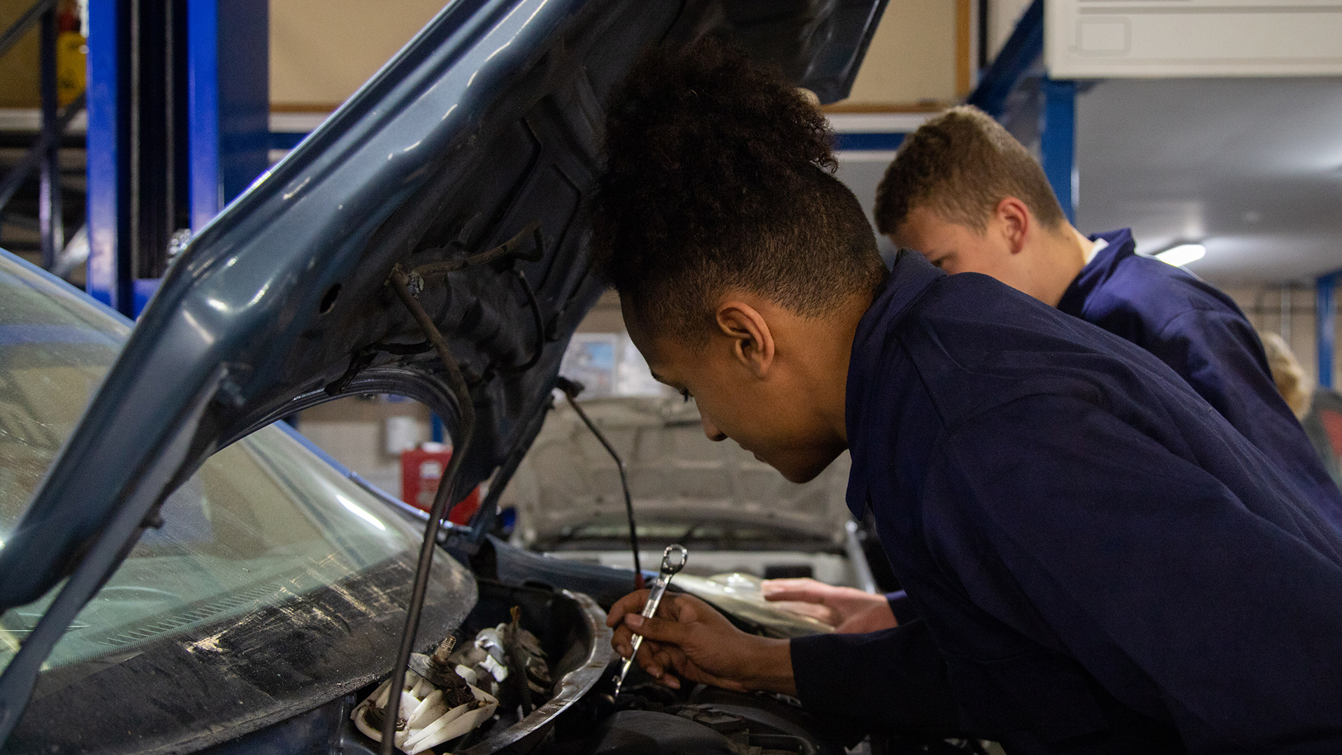 image of education learner working on a car