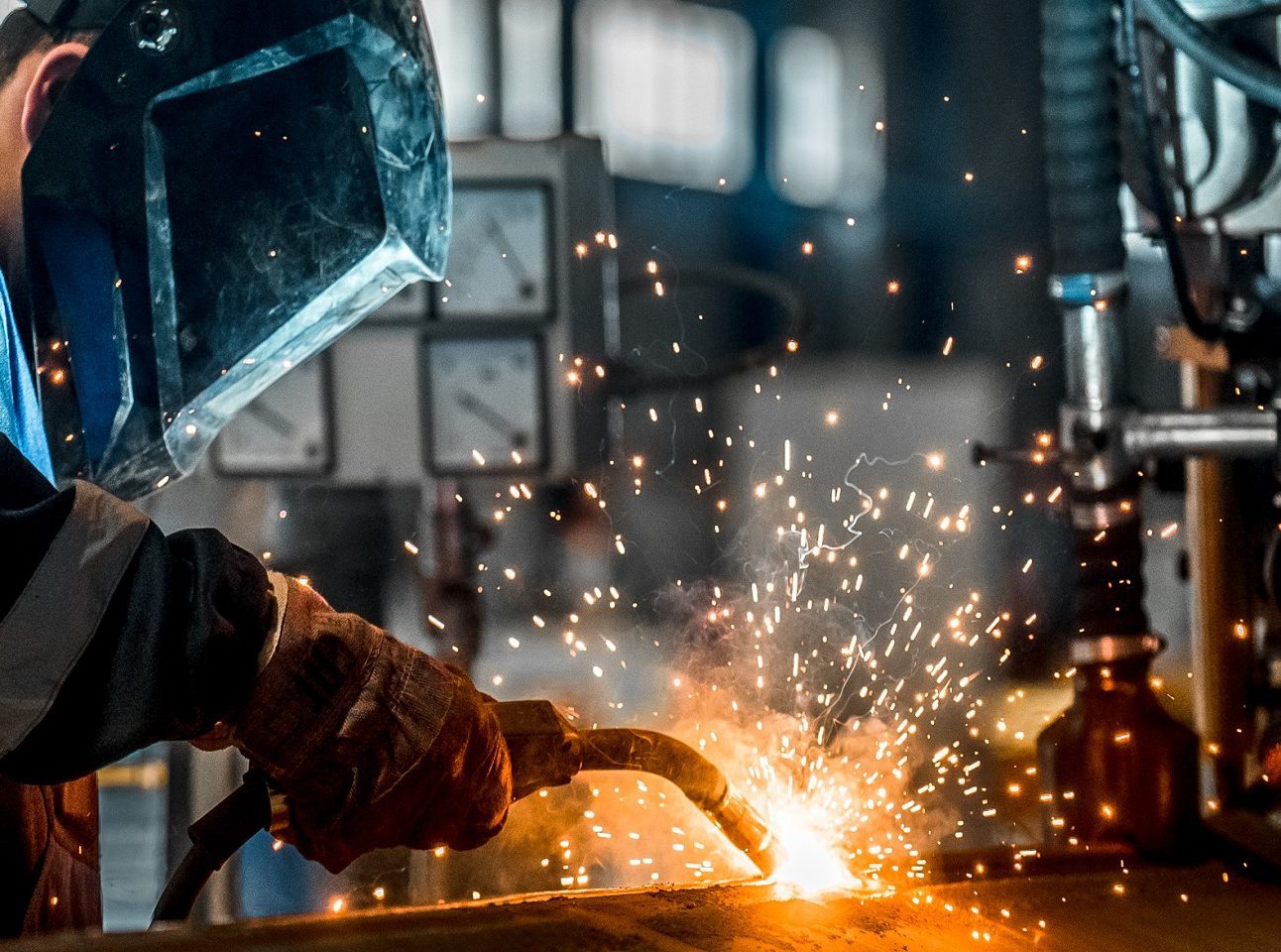 Person doing metal welding